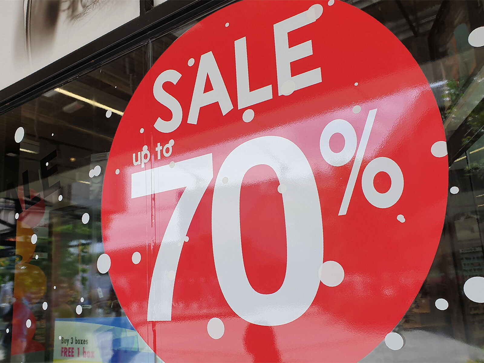 Red sale window sticker on a shop window