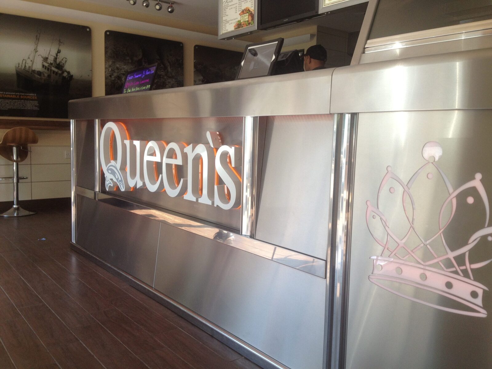 Queen's illuminated interior signage and screens